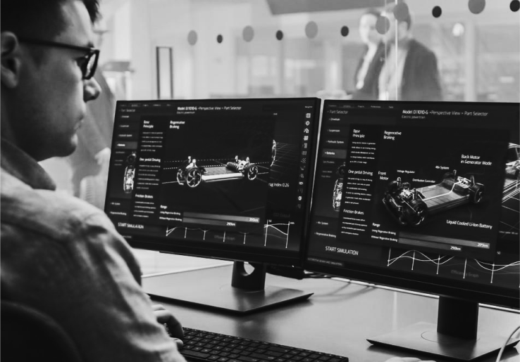 Two monitors comparing images of a device